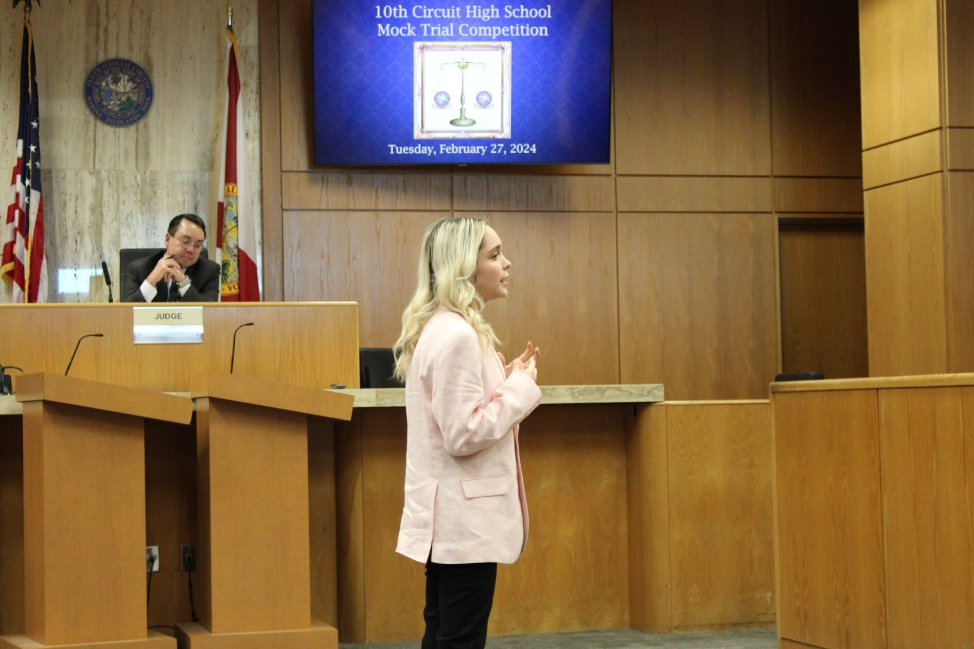 Student from George Jenkins High School standing before Judge for closing arguments