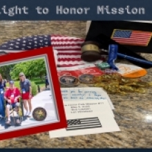 Flight To Honor Mission 11 - Circuit Judges Brenda P. Ramirez, Melissa Gravitt, and Lori Winstead standing next to two United States Veterans in Washington, D.C. on May 5, 2026